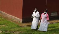 Ugandan medical staff are seen as they inspect the Ebola preparedness facilities at the Bwera general hospital near the border with the Democratic Republic of Congo in Bwera, Uganda, June 12, 2019. REUTERS/Samuel Mambo