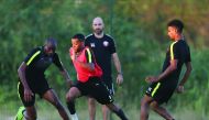 FROM LEFT: Qatar’s Abdelkarim Hassan, Pedro Miguel and Akram Afif in action as coach Felix Sanchez looks on during a training session in Rio de Janeiro on the eve of their opening match of the 2019 Copa America against Paraguay, which will be played at th