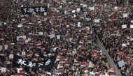 Thousands of protesters dressed in black take part in a new rally against a controversial extradition law proposal in Hong Kong on June 16, 2019. AFP / Dale De La Rey 