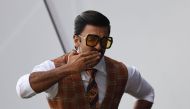 Indian Bollywood actor Ranveer Singh poses as he watches play during the 2019 Cricket World Cup group stage match between India and Pakistan at Old Trafford in Manchester, northwest England, on June 16, 2019. AFP / Dibyangshu Sarkar 