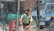 Indian paramilitary trooper stand guard in the centre of Srinagar on June 13, 2019.  AFP / Tauseef MUSTAFA