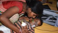 This photo taken on June 17, 2019, shows an Indian child suffering from Acute Encephalitis Syndrome (AES) at the government-run Sri Krishna Medical College and Hospital in Muzaffarpur district in the eastern state of Bihar. AFP
