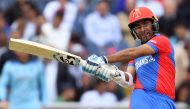 Afghanistan's Hashmatullah Shahidi plays a shot during the 2019 Cricket World Cup group stage match between England and Afghanistan at Old Trafford in Manchester, northwest England, on June 18, 2019. AFP / Dibyangshu Sarkar 
