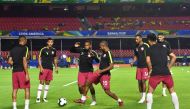 Players of Qatar warm up before their Copa America football tournament group match against Colombia at the Cicero Pompeu de Toledo Stadium, also known as Morumbi, in Sao Paulo, Brazil, on June 19, 2019.  AFP / Nelson Almeida 