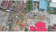 An overhead view of a collapsed under-construction building in Sihanoukville, Cambodia June 22, 2019. REUTERS