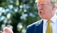 US President Donald Trump speaks to the media prior to departing on Marine One from the South Lawn of the White House in Washington, DC, June 22, 2019, as he travels to Camp David, Maryland. AFP / SAUL LOEB