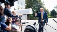 US President Donald Trump speaks to the media prior to departing on Marine One from the South Lawn of the White House in Washington, DC, June 22, 2019, as he travels to Camp David, Maryland. / AFP / SAUL LOEB