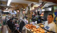 A Latin American-style bakery is seen at the Seven Sisters indoors market in north London on June 15, 2019. AFP / Daniel LEAL-OLIVAS