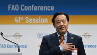 Newly-appointed FAO Director-Feneral, China's Qu Dongyu acknowledges applause following the vote on June 23, 2019 during the FAO 41st Conference at the Food and Agriculture Organization of the United Nations (FAO) headquarters in Rome. AFP / Vincenzo Pint