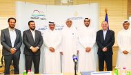The officials during the signing ceremony. 