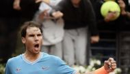 Rafael Nadal of Spain celebrates after winning against Greece's Stefanos Tsitsipas during their ATP Masters tournament semi final tennis match at the Foro Italico camp in Rome, on May 18, 2019. (AFP / Filippo MONTEFORTE)
