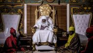 Mohammed Abubakar Bambado, the Sarkin Fulani of Lagos, poses for a portrait on his throne in his palace at the district of Surulere in Lagos, Nigeria, on April 29, 2019.  AFP / Luis tato 