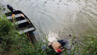 View of the bodies of Salvadoran migrant Oscar Martinez Ramirez and his daughter, who drowned while trying to cross the Rio Grande -on their way to the US- in Matamoros, state of Tamaulipas on June 24, 2019. AFP
 