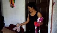 Rosa Ramirez, mother of Oscar Alberto Martinez Ramirez, a migrant who drowned in the Rio Grande River with his daughter Valeria during their journey to the U.S., is pictured at her house in the Altavista neighbourhood in San Martin, El Salvador June 26, 2