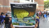 A map of Mexico as it was in 1794 is displayed as young immigrants and their supporters rally in support of DACA in Los Angeles, California on September 1, 2017. AFP/Frederic J Brown
