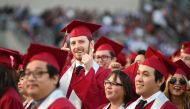 REPRESENTATIVE IMAGE: Students earning degrees at Pasadena City College participate in the graduation ceremony June 14, 2019 in Pasadena, California. AFP/Robyn Beck