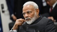 India's Prime Minister Narendra Modi attends a meeting with US President Donald Trump and Japanese Prime Minister Shinzo during the G20 Osaka Summit in Osaka on June 28, 2019. / AFP / Brendan Smialowski