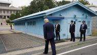 US President Donald Trump walks to meet with North Korean leader Kim Jong Un at the demilitarized zone separating the two Koreas, in Panmunjom, South Korea, June 30, 2019. (REUTERS/Kevin Lamarque)