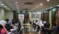 Jordan’s Minister of Labour, Nedal El Batayneh (centre), addressing the meeting.