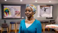 Marwa Gibril, one of the organisers of Art of the Sudanese Revolution exhibition poses at at SOAS University in London on July 5, 2019.  AFP / Tolga Akmen 
