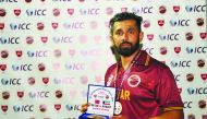 Qatar’s Mohammad Rizlan poses with his award at the end of the three-match Twenty20 International Series against Kuwait at the Asia Town Cricket Stadium on Saturday.
