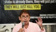 Butch Olano (L), Amnesty International section representative speaks during a press conference in Manila on July 8, 2019. AFP / Ted Aljibe 
