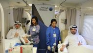 Ahlibank officials at the blood donation event. 