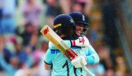  England's Eoin Morgan and Joe Root celebrate after the match. (Action Images via Reuters/Andrew Boyers) 
