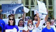 Immigration activists gather in front of the U.S. Customs and Border Protection Headquarters to protest President Trumps immigration positions, family separation policy, and immigration raids planned for this weekend, on July 12, 2019 in Washington, DC. M