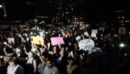 Hundreds of people gather in lower Manhattan for a 