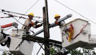Crews work to restore power after Hurricane Barry in New Orleans, Louisiana, US, July 14, 2019. Reuters/Jonathan Bachman