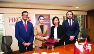 Sheikha Alanoud bint Hamad Al Thani (second left), Managing Director, Business Development, QFC; and other officials during the signing ceremony in Hong Kong.