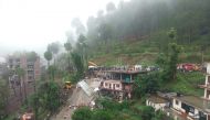 Indian rescuers work on a site after a multi-storey building collapsed following heavy rains near Kumarhatti, in Himachal Pradesh’s Solan district on At least eight people were killed after a house collapsed in northern India following heavy monsoon rain 