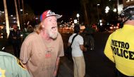 FILE PHOTO: A Donald Trump supporter yells at anti-Trump protesters outside the Trump International Hotel, Las Vegas. (Ethan Miller /Getty Images /AFP) 