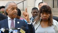 National Action Network founder and President Rev. Al Sharpton speaks to the media alongside Eric Garner's mother Gwen Carr (R) outside the Eastern District of New York on July 16, 2019.   (AFP / Timothy A Clary)

