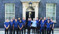 Tom Curran, Jos Buttler, James Vince, Chris Woakes, Moeen Ali, Adil Rashid, Jonny Bairstow,  Eoin Morgan, Prime Minister Theresa May,  Jason Roy,  Jofra Archer,  Joe Root,  Ben Stokes, England's Mark Wood,  Liam Plunkett and Liam Dawson pose for a photogr