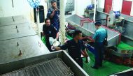 In this photograph taken on July 15, 2019 Indonesian officers check the MV Nika vessel after it was detained by Indonesia's authority in Batam, Kepulauan Riau.  AFP / Sei Ratifa