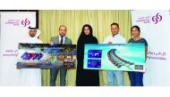 The winners of  “Spend & Win your Dream Holiday” campaign posing with officials of Commercial Bank.