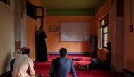 Students of Rizwan Pandit, a school principal who was allegedly killed in police custody, are seen inside the classroom of a coaching centre run by him in Awantipora, south of Srinagar, July 9, 2019. Reuters/Danish Siddiqui