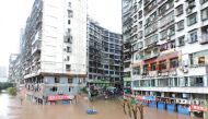This photo taken on July 18, 2019 shows a flooded street in Dazhou City, in China's southwest Sichuan Province. AFP