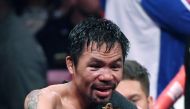 Manny Pacquiao celebrates his split-decision victory over Keith Thurman in their WBA welterweight title fight at MGM Grand Garden Arena on July 20, 2019 in Las Vegas, Nevada. Ethan Miller/Getty Images/AFP