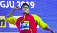 Gold medallist China's Sun Yang poses with his medal after the final of the men's 400m freestyle event during the swimming competition at the 2019 World Championships at Nambu University Municipal Aquatics Center in Gwangju, South Korea, on July 21, 2019.
