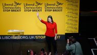New Liberal Democrat leader Jo Swinson waves on stage at an event annoucing the result of the leadership contest in central London on July 22, 2019. Jo Swinson, Vince Cable's deputy for two years, was unveiled as the new leader of the Liberal Democrats. (