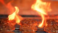 Veggie burgers are cooked over a flame on a grill in Greenwich, Connecticut, US, on June 26, 2017. Reuters/Adrees Latif