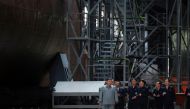 This undated picture released from North Korea's official Korean Central News Agency (KCNA) on July 23, 2019 shows North Korean leader Kim Jong Un (L) inspecting a newly built submarine at an undisclosed location. – (AFP PHOTO/KCNA VIA KNS) 