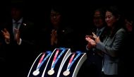 Design of the Tokyo 2020 Olympic medals are unveiled during the 'One Year to Go' ceremony celebrating one year out from the start of the summer games at Tokyo International Forum in Tokyo, Japan July 24, 2019. REUTERS/Issei Kato