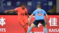 Paris Saint Germain's Kylian Mbappe (L) fights for the ball with Sydney FC's Harry Van Der Saag (R) at Suzhou Olympic Sports Center Stadium during the International Super Cup in Suzhou, Jiangsu province on July 30, 2019. (AFP / HECTOR RETAMAL)