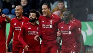FILE PHOTO: Liverpool's Virgil van Dijk celebrates scoring their first goal with Mohamed Salah, Sadio Mane and teammates Action Images via Reuters/Lee Smith 