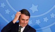 Brazil's President Jair Bolsonaro gestures during a review and modernization ceremony of occupational health and safety work at the Planalto Palace in Brasilia, Brazil July 30, 2019. (REUTERS/Adriano Machado)