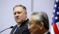 US Secretary of State Mike Pompeo (L) listens as Thailand's Foreign Minister Don Pramudwinai speaks during a press conference at the Association of Southeast Asian Nations (ASEAN) Foreign Ministers' Meeting in Bangkok on August 1, 2019. / AFP / POOL / JON